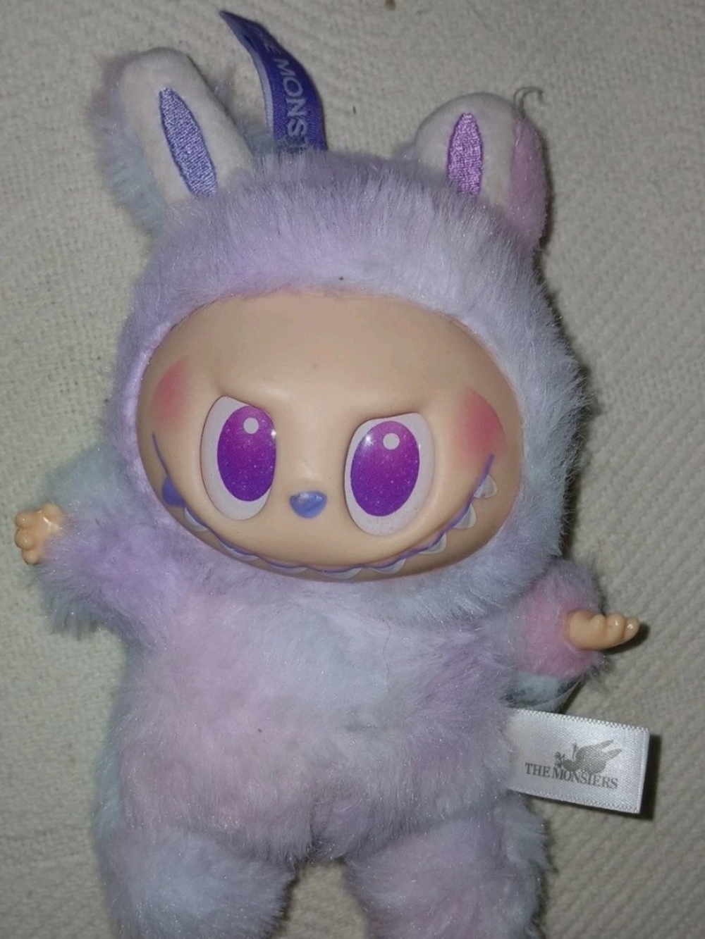 The Monsters Plush Doll in Pastel Lavender-Pink. Big Into Energy.
